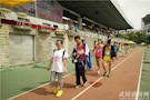 武陵区委政法委学田工爱心志愿服务队倾情助力常德市七运会田径赛